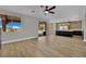 Open floor plan that connects the kitchen, living room, and backyard pool area at 1984 Troon Dr, Henderson, NV 89074