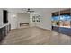 Spacious living room with modern fireplace and large windows, offering plenty of light at 1984 Troon Dr, Henderson, NV 89074