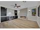Living room showcasing built-in cabinetry, fireplace, and modern lighting at 1984 Troon Dr, Henderson, NV 89074