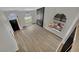 Open living room offers lots of natural light with multiple windows and a stylish fireplace at 1984 Troon Dr, Henderson, NV 89074