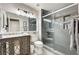 Beautiful bathroom features a glass enclosed shower, granite counters, and modern fixtures at 2036 Deer Springs Dr, Henderson, NV 89074