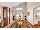Elegant dining room featuring a large table, hardwood floors, and ample natural light at 2036 Deer Springs Dr, Henderson, NV 89074