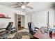 Spacious home office with two work spaces, ceiling fan, and a large closet at 2036 Deer Springs Dr, Henderson, NV 89074