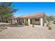 Backyard featuring low-maintenance desert landscaping and a covered patio at 2216 Spring Water Dr, Las Vegas, NV 89134