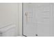 Bright and airy bathroom with a modern shower, gold fixtures, and a white toilet at 2216 Spring Water Dr, Las Vegas, NV 89134