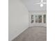 Bright bedroom with neutral carpet and a large bay window overlooking the backyard at 2216 Spring Water Dr, Las Vegas, NV 89134
