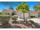 Charming single-story home with a two-car garage and low maintenance desert landscaping at 2216 Spring Water Dr, Las Vegas, NV 89134