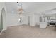 Bright living room features wood-look floors, high ceilings, modern lighting, and an open floorplan at 2216 Spring Water Dr, Las Vegas, NV 89134