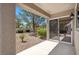 Cozy patio with desert landscaping and sliding glass doors at 2216 Spring Water Dr, Las Vegas, NV 89134