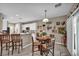 Bright dining area, blending seamlessly with the kitchen, and featuring a sliding glass door for easy access at 2621 Icy Moon St, Henderson, NV 89044