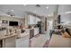 Bright kitchen featuring stainless steel appliances, light countertops, and white cabinets at 2621 Icy Moon St, Henderson, NV 89044