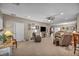 Bright open-concept living room with an adjacent dining area, creating a connected and inviting living space at 2621 Icy Moon St, Henderson, NV 89044