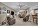 Spacious open-concept living room that connects seamlessly with the dining area and kitchen at 2621 Icy Moon St, Henderson, NV 89044