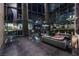 Sleek lobby with modern furnishings, floor-to-ceiling windows, and city views at 3722 S Las Vegas Blvd # 503, Las Vegas, NV 89158