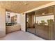 View of patio with slider door for easy access to the unit at 3827 Desert Marina Dr # 211, Laughlin, NV 89029