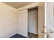 Outdoor balcony featuring low fence, sliding door access, and textured walls at 3827 Desert Marina Dr # 211, Laughlin, NV 89029