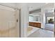 Bathroom featuring separate shower and soaking tub and dual vanities at 3827 Desert Marina Dr # 211, Laughlin, NV 89029