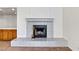 Close-up of the fireplace in the living room with tile surround and hearth at 3827 Desert Marina Dr # 211, Laughlin, NV 89029