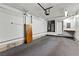 Spacious garage with attached shelving, electrical outlets and lighting at 3827 Desert Marina Dr # 211, Laughlin, NV 89029