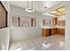 Bright kitchen featuring tile floors, a ceiling light fixture, and ample counter space at 3827 Desert Marina Dr # 211, Laughlin, NV 89029