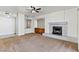 Spacious living room showcasing a fireplace and a ceiling fan at 3827 Desert Marina Dr # 211, Laughlin, NV 89029