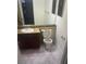 Well-lit bathroom with a granite countertop, sink, and tiled floors at 4050 Pacific Harbors Dr # 149, Las Vegas, NV 89121