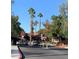 Gated community entrance with lush landscaping and a secure entry point for peace of mind at 4050 Pacific Harbors Dr # 149, Las Vegas, NV 89121