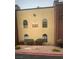 Condominium exterior with visible unit numbers and well-maintained landscaping at 4050 Pacific Harbors Dr # 149, Las Vegas, NV 89121