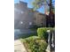 Well-maintained townhome exterior with tidy landscaping, sidewalks, and ample natural light at 4050 Pacific Harbors Dr # 149, Las Vegas, NV 89121