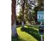 Community pet waste station surrounded by manicured grounds and mature trees at 4050 Pacific Harbors Dr # 149, Las Vegas, NV 89121