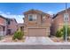 Attractive two-story home with a well-maintained front yard and a two-car garage at 4609 Hearts Desire Ave, Las Vegas, NV 89115