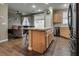 Open kitchen layout with central island and modern stainless steel appliances at 4609 Hearts Desire Ave, Las Vegas, NV 89115