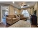 Inviting living room with comfortable seating and a view into another room at 4609 Hearts Desire Ave, Las Vegas, NV 89115