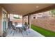 Covered patio featuring a dining area, perfect for outdoor living and enjoyment at 4609 Hearts Desire Ave, Las Vegas, NV 89115