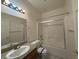Bathroom featuring tub-shower, vanity with a granite counter, and a framed mirror at 4831 W Bell Vista Ave, Pahrump, NV 89060