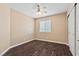 Bedroom featuring wood-look flooring, ceiling fan and a double door closet at 5 Spur Cross Cir, Henderson, NV 89012