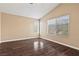 Bedroom with wood-look flooring, neutral paint and vaulted ceiling at 5 Spur Cross Cir, Henderson, NV 89012