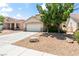 Charming home featuring a two-car garage, desert landscaping, and a concrete driveway at 5 Spur Cross Cir, Henderson, NV 89012