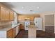Well-lit kitchen with stainless steel appliances, granite countertops, and wood cabinets at 5 Spur Cross Cir, Henderson, NV 89012