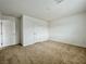 Spacious bedroom with neutral walls and carpet is awaiting your personal touch at 5709 Woodchester Ave, Las Vegas, NV 89139
