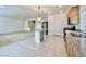 Open kitchen layout featuring an island, pendant lighting, granite countertops, and stainless appliances at 5709 Woodchester Ave, Las Vegas, NV 89139