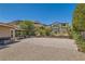 Wide-open backyard space with desert landscaping, offering a serene and low-maintenance outdoor experience at 5879 Sky Heights Ct, Las Vegas, NV 89135
