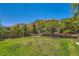 The backyard offers beautiful landscaping and mountain views, creating a serene and picturesque setting at 5879 Sky Heights Ct, Las Vegas, NV 89135