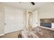 Bedroom features closet, bed, and carpet at 5879 Sky Heights Ct, Las Vegas, NV 89135