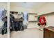The walk-in closet features carpet, ample storage, and a window for natural light at 5879 Sky Heights Ct, Las Vegas, NV 89135