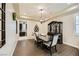 Elegant dining room with tray ceilings, modern lighting, and stylish furniture perfect for entertaining guests at 5879 Sky Heights Ct, Las Vegas, NV 89135