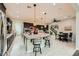 This open kitchen offers a center island, stainless appliances, and flows nicely into the dining area at 5879 Sky Heights Ct, Las Vegas, NV 89135
