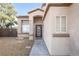 Exterior close up of the front of a single-Gathering home with desert landscaping at 6101 Browning Way, Las Vegas, NV 89130