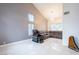 Modern living room with high ceilings, and sleek furnishings at 6101 Browning Way, Las Vegas, NV 89130