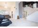 Spacious living area featuring high ceilings, a modern sofa, and designer accents at 6101 Browning Way, Las Vegas, NV 89130